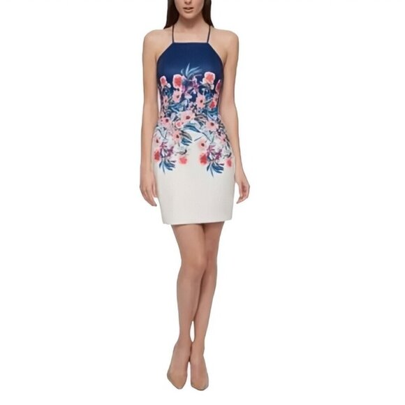 A strappy back adds allure to an apron-front bodycon dress wrapped in flowers - - Picture 2 of 5